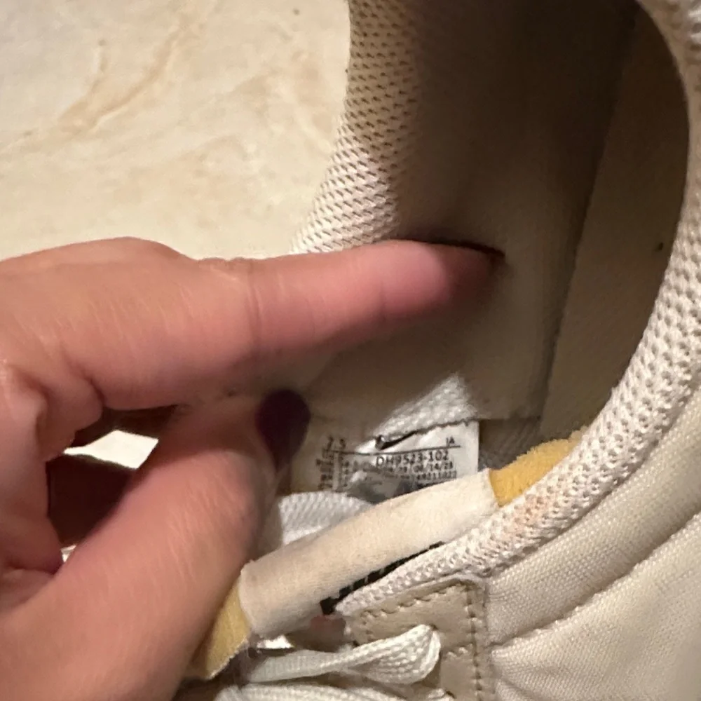 Nike Women's Cream and Black Sneakers